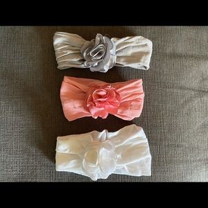 3 infant girl flower headbands.